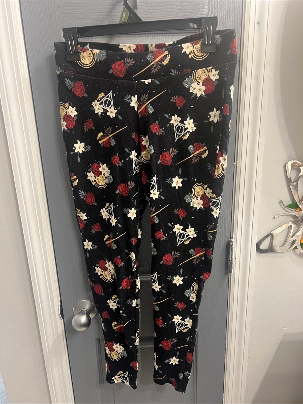 Warner Bros. Black Leggings with Red Rose & Gold Magic Motifs